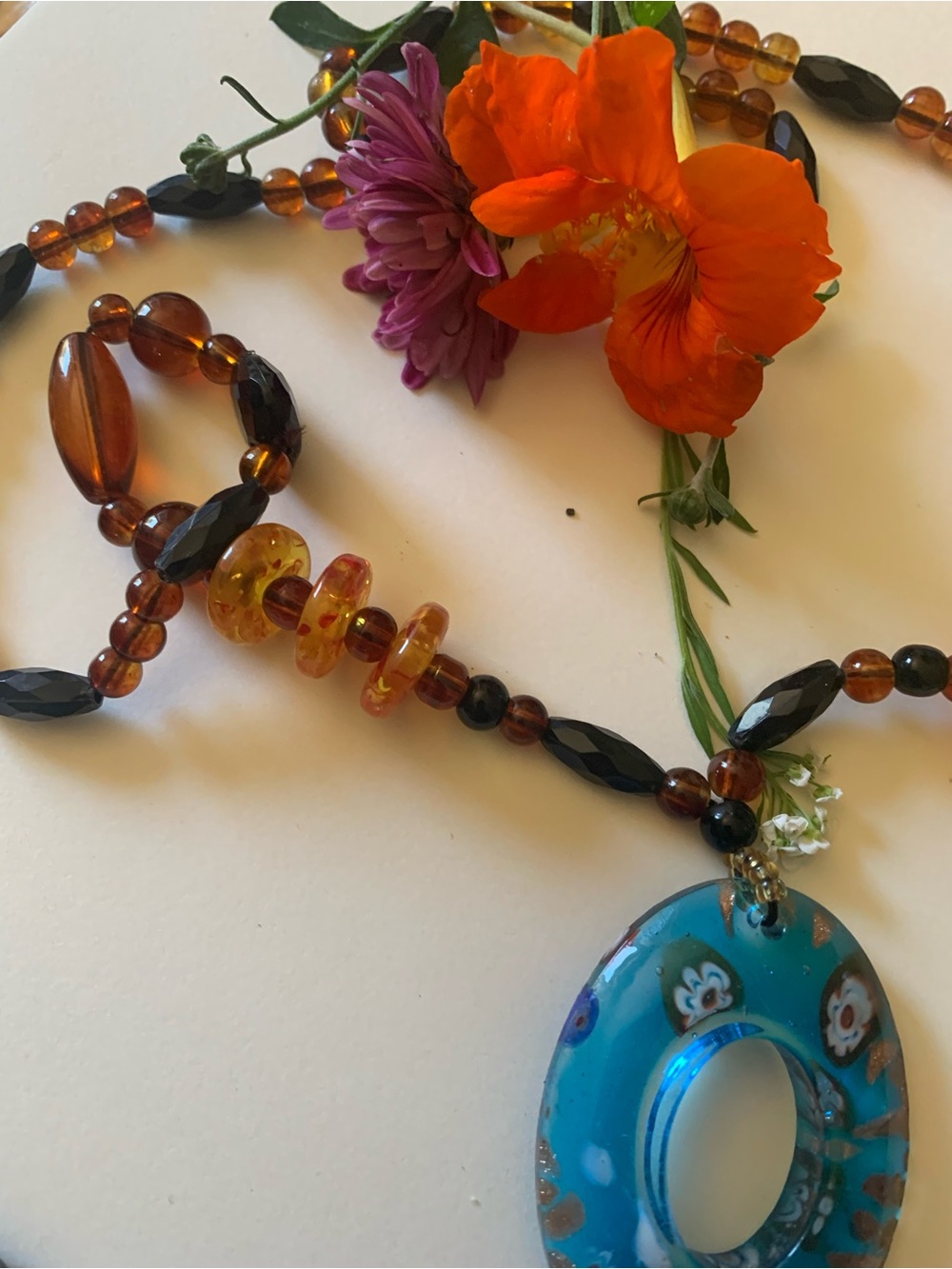 Handcrafted Amber Bead Necklace with Turquoise Millefiori Pendant